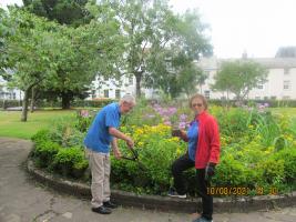 David and Dorothy tending the garden